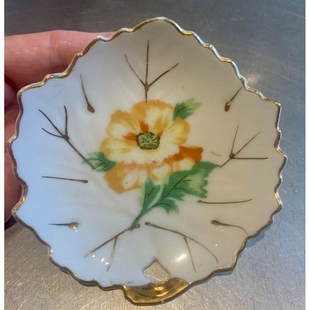 Vtg small porcelain trinket dish with yellow flower and gold paint detailing
